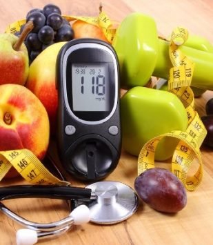 Happy family. Husband, pregnant wife and son look on baby clothes for newborn at home. Nine months. Baby Shower.